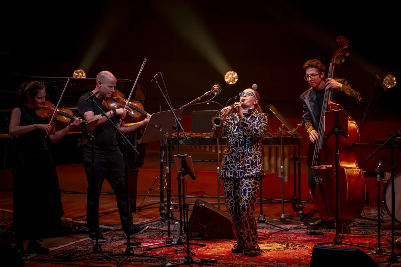 Jess Gillam and her band on stage