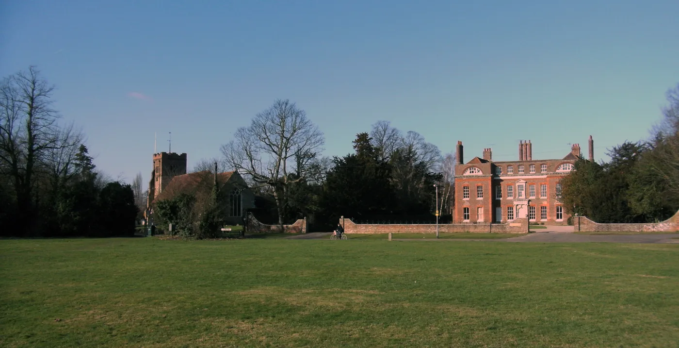 Springfield Green, with Holy Trinity Church on the left. The picture does not show the play area